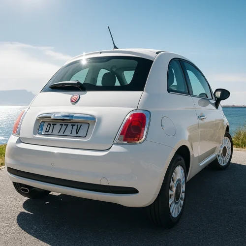 white-fiat-by-the-ocean-sea-point-car-hire